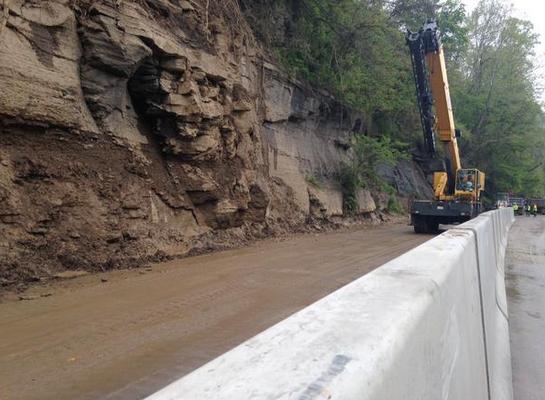 A concrete barrier was in place Friday morning on U.S. Route 60 near Cedar Grove .