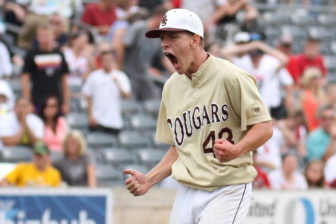 Jefferson pitcher Brad Davis celebrates the Class AAA state title after pitching a complete game against Nitro on Saturday, in Charleston, W.Va.