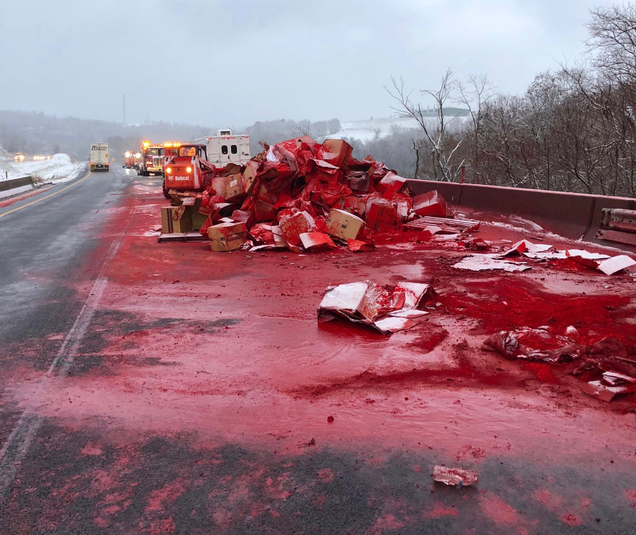 Truck hauling red dye crashes on I-70 near Wheeling causing mess - WV