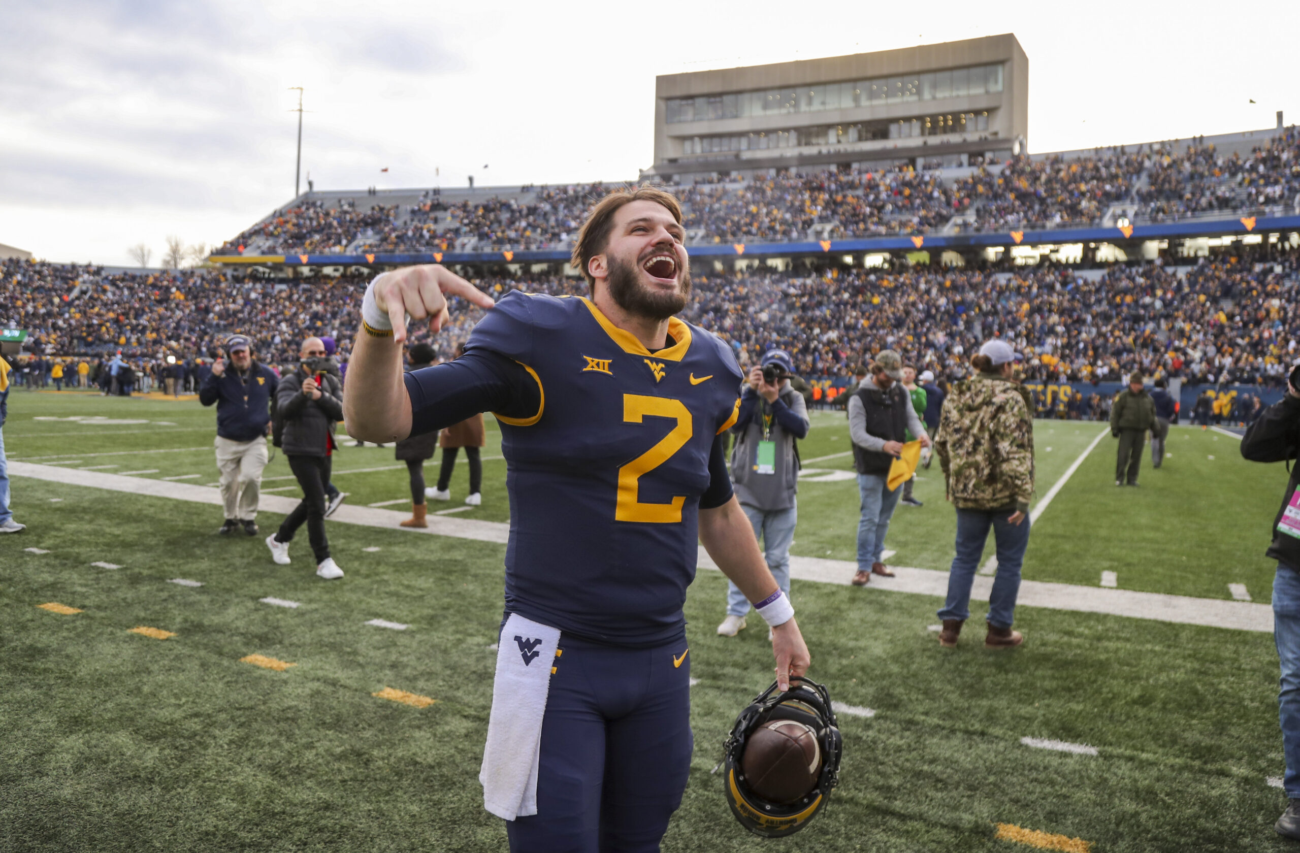West Virginia tops Texas 3123, maintains hope of reaching bowl game