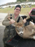 David Long of Buckhannon, W.Va. with a 10 point buck he killed in Upshur County.  
