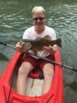 Scott Wegmann of South Charleston with a nice smallmouth caught while fishing in the Elk River. 
