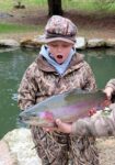 Clare Lyons who helps run Mountainwateradventures.com
A fly fishing operation in Monroe County W.Va. had this youngster and his dad on a fishing trip and caught the youngsters expression after coming face to face with a lunker rainbow
