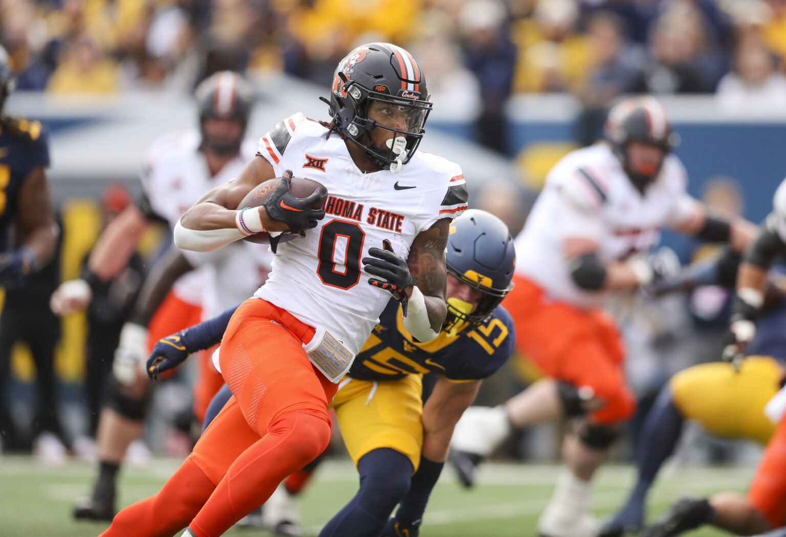 Gordon guides Oklahoma State to fifth straight win in Morgantown