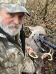 Rusty Lane of Marlinton, W.Va. with a nice 8 point buck he killed hunting with a crossbow in Pocahontas County, W.Va. 
