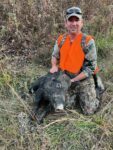 Daniel Curry  of Fairmont, W.Va. with a wild boar harvested in Logan County, W.Va. on October 28th, 2023.
