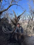 David VanBibber of Charleston, W.Va. shows off a massive bull elk he killed on a hunt on public land in New Mexico with a muzzleloader. 
